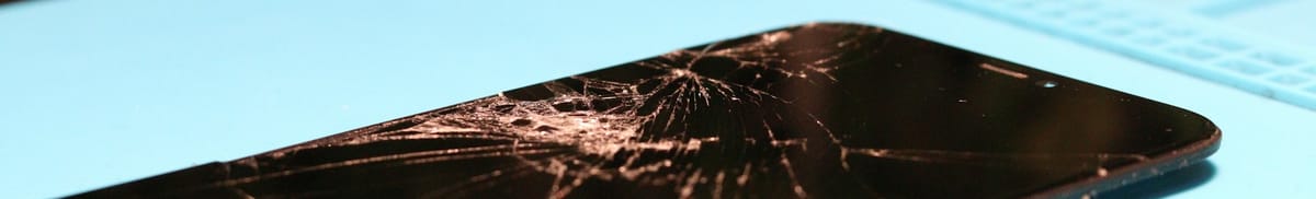 A smartphone with a shattered screen.